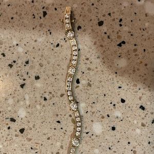 Diamonique Wave Style Tennis Bracelet round cut 14kt Yellow Gold